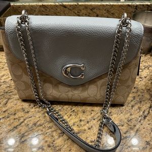 Coach purse with multiple slots
